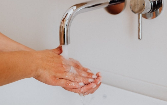 person-washing-hands